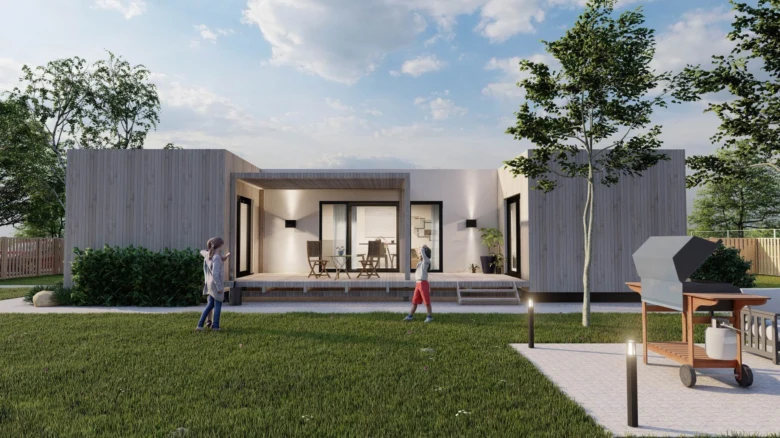Moderní modulový dům s dřevěnou fasádou na trávníku.