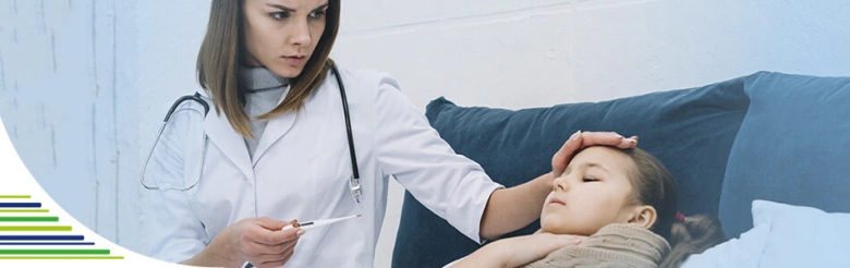 Doctor checking child's fever