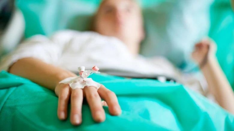 Hospital patient hand with iv