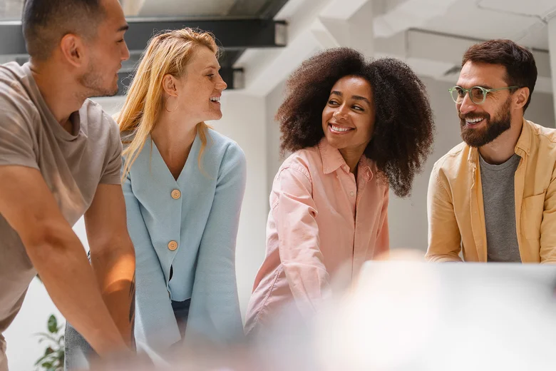 Diverse team collaborating happily