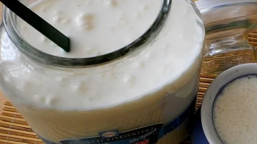 Kefir in jar with spoon