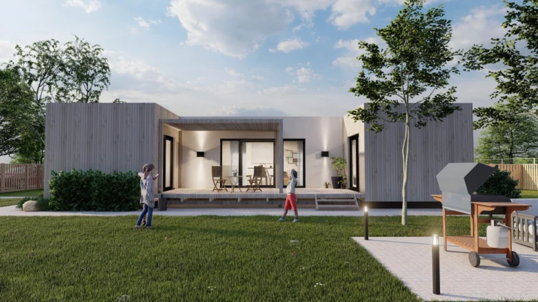 Moderní modulový dům s velkým oknem a zahradou.