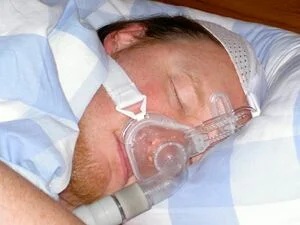 Man with cpap mask sleeping