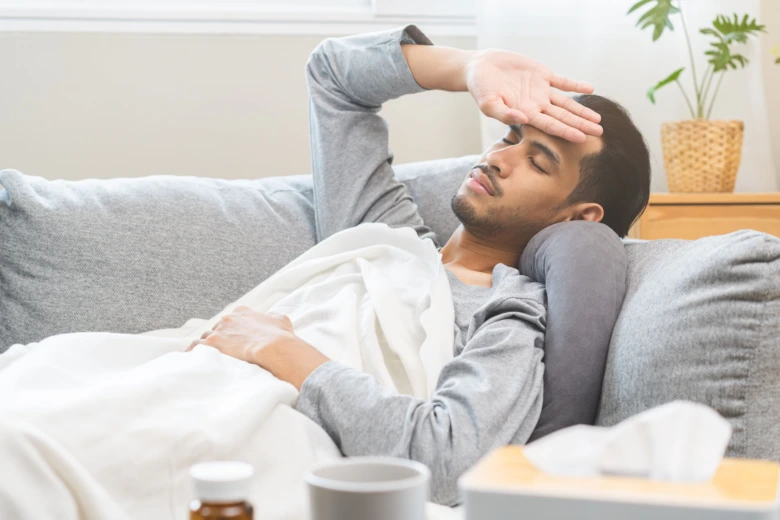Man sick on couch