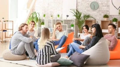 Group of people sitting in circle